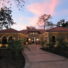 Spanish-colonial courtyard and fountain at sunset